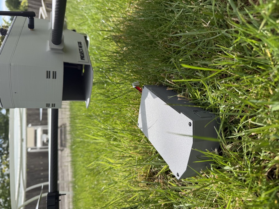 The Aegis battery pack on the ground beneath the aircraft's open battery bay